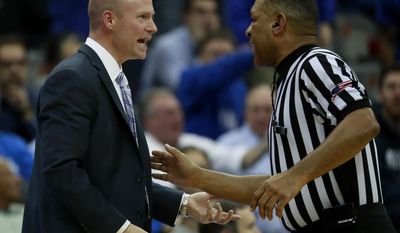 Seton Hall head coach Kevin Willard, left, argues with an official during the first half of an NCAA college basketball game against Creighton, Wednesday, Feb. 15, 2017, in Newark, N.J. (AP Photo/Julio Cortez)