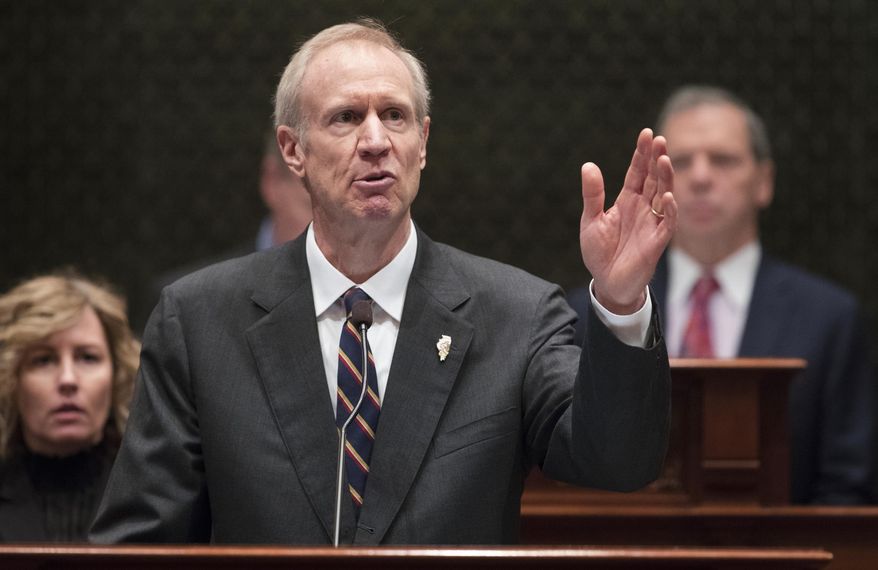 FILE - In this Jan. 25, 2017, file photo, Illinois Gov. Bruce Rauner delivers his State of the State address in the Illinois House chamber in Springfield, Ill. Gov. Rauner is gearing up to deliver his third budget address on Wednesday, Feb. 15, 2017, during a joint session of the Legislature. The prospects that it will be adopted into law are as slim as they were for the first two. They were shelved. (Ted Schurter/The State Journal-Register via AP File)