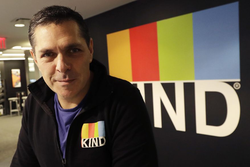 In this Monday, Feb. 6, 2017, photo, Kind CEO Daniel Lubetzky poses for a photo at his office, in New York. Lubetzky is pledging $25 million over the next 10 years to create a nonprofit dedicated to “revealing and countering” the food industry’s influence on public health. The move underscores the division between “Big Food” companies and newer players that market themselves as wholesome alternatives aligned with public health. (AP Photo/Mark Lennihan)