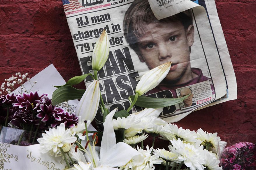FILE - In this May 28, 2012, file photo, a newspaper with a photograph of Etan Patz is part of a makeshift memorial in the SoHo neighborhood of New York. Pedro Hernandez was convicted Tuesday, Feb. 14, 2017, for the 1979 murder of Etan Patz. (AP Photo/Mark Lennihan, File)