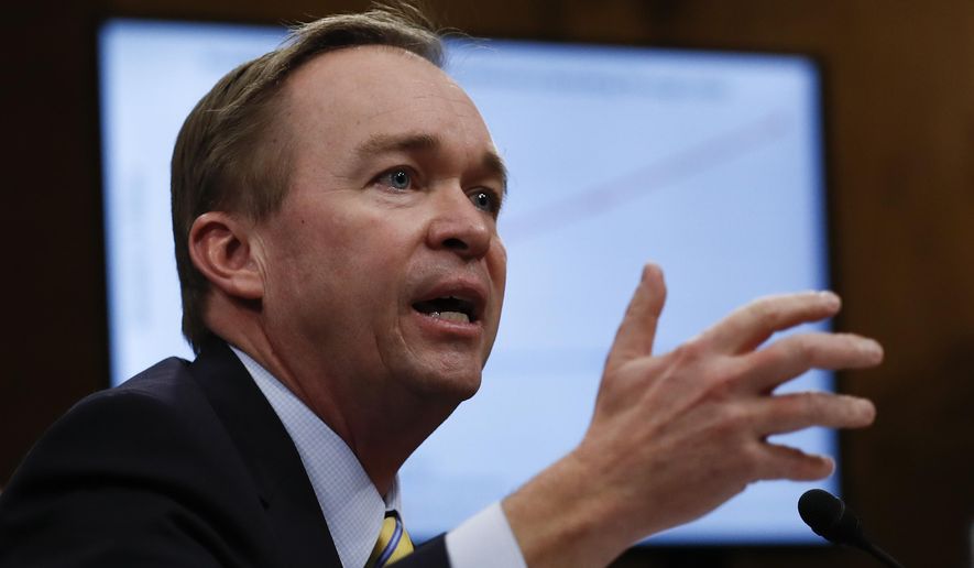 In this Jan. 24, 2017 file photo, Budget Director-designate Rep. Mick Mulvaney, R-S.C. testifies on Capitol Hill in Washington at his confirmation hearing before the Senate Budget Committee. Mulvaney has cleared a routine Senate hurdle. But at least two senior Republicans have voiced doubts about supporting him in a Thursday, Feb. 16, 2017, confirmation vote. (AP Photo/Carolyn Kaster, File)