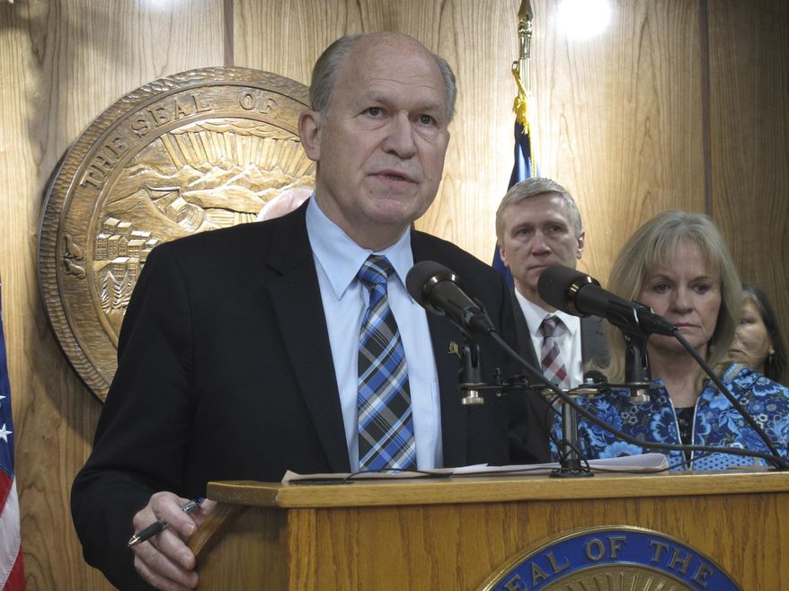 Alaska Gov. Bill Walker holds a news conference on Thursday, Feb. 16, 2017, in Juneau, Alaska, that focused on the state's response to widespread opioid abuse. Walker this week issued a public health disaster declaration stemming from the abuse of opioids in Alaska. (AP Photo/Becky Bohrer)