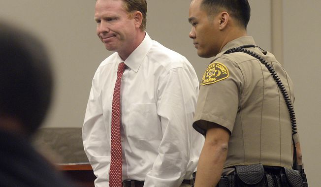 Imprisoned Utah businessman Jeremy Johnson is lead out of the courtroom during John Swallow&#x27;s trial Wednesday, Feb. 15, 2017, in Salt Lake City. He was found in contempt of court. Johnson, who was expected to be a key witness at a corruption trial for the former state attorney general is being held in contempt of court after he refused to testify. (Al Hartmann/The Salt Lake Tribune, via AP, Pool)