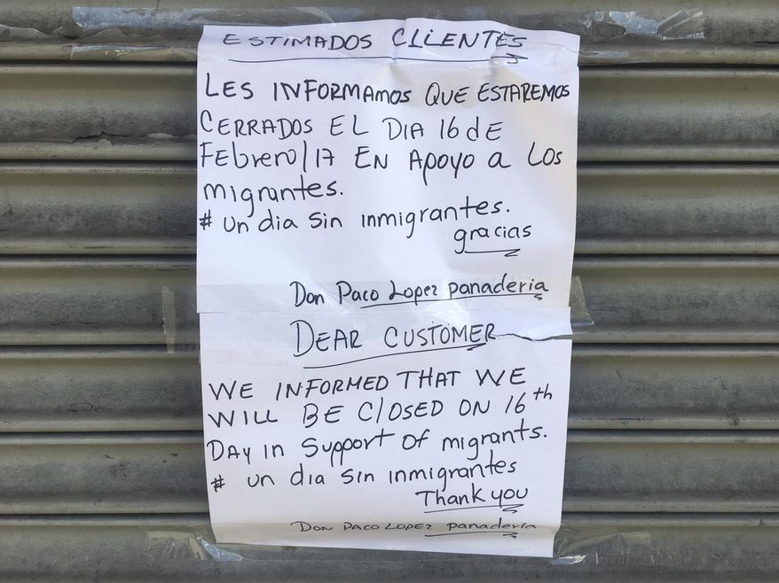 A sign at Don Paco Panaderia in East Harlem says the business is closed today in support of a "day without immigrants" in the East Harlem neighborhood of New York, on Thursday Feb. 16, 2017. The shop was participating in the boycott called A Day Without Immigrants, aimed squarely at President Donald Trump's efforts to crack down on immigration. (AP Photo/Claudia Torrens)