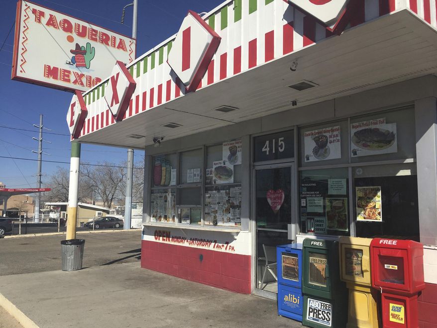 The normally busy Taqueria Mexico in downtown Albuquerque sits empty Thursday, Feb. 16, 2017, Albuquerque, N.M., after owners opted to keep the restaurant closed in solidarity with a nationwide protest called A Day Without Immigrants. Immigrants around the U.S. stayed home from work and school Thursday to demonstrate how important they are to America's economy and its way of life, and many businesses closed in solidarity. (AP Photo/Russell Contreras)