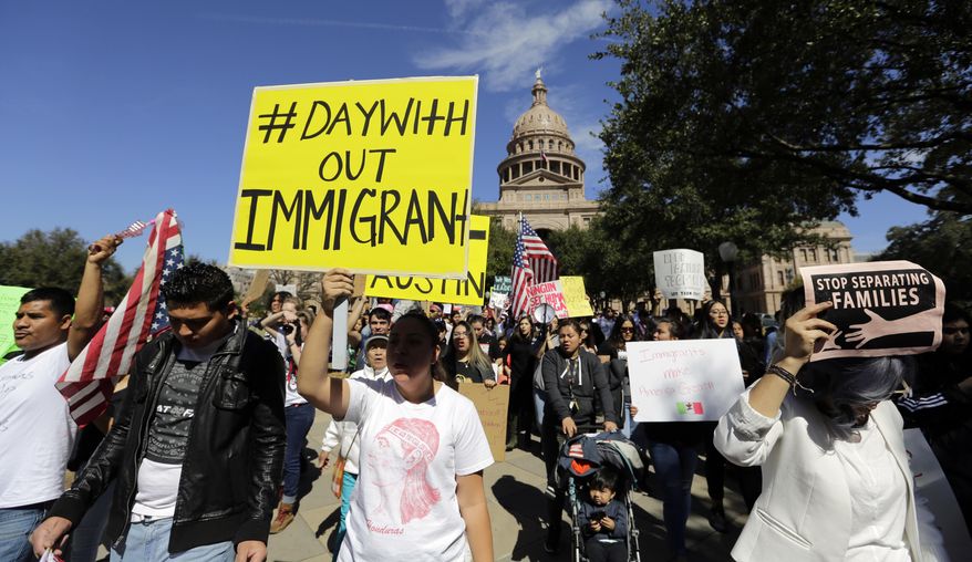 A group marches away from the Texas Capitol during an immigration protest, Thursday, Feb. 16, 2017, in Austin, Texas.Immigrants around the U.S. stayed home from work and school Thursday to demonstrate how important they are to America’s economy and its way of life, and many businesses closed in solidarity, in a nationwide protest called A Day Without Immigrants. (AP Photo/Eric Gay)