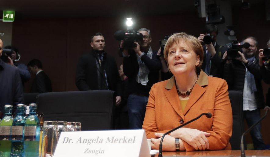 German Chancellor Angela Merkel arrives for a questioning at an investigation committee of the German federal parliament looking into alleged U.S. surveillance in Germany and the activities of Germany&#39;s own foreign intelligence service in Berlin, Germany, Thursday, Feb. 16, 2017. (AP Photo/Michael Sohn)