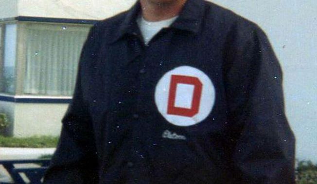 In this 1970 family photo provided by Lori Cooper, Columbus, Ohio, police officer Niki Cooper poses in his "Company D" jacket signifying his membership in a unit of officers that worked an 8 p.m. to 4 a.m. swing shift during the police department's busiest hours. An 82-year-old man who was indicted, but never prosecuted, in the nonfatal shooting of Cooper almost 45 years ago cannot be tried now, a judge ruled Thursday, Feb. 16, 2017. Cooper, who died just over three years ago at 71, rarely spoke of the event and his family said he was never the same afterward. (Photo courtesy of Lori Cooper via AP)
