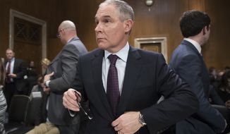 Oklahoma Attorney General Scott Pruitt, the Environmental Protection Agency Administrator-designate, is seen on Capitol Hill in Washington at his confirmation hearing before the Senate Environment and Public Works Committee on Jan. 18, 2017. (Associated Press) **FILE**