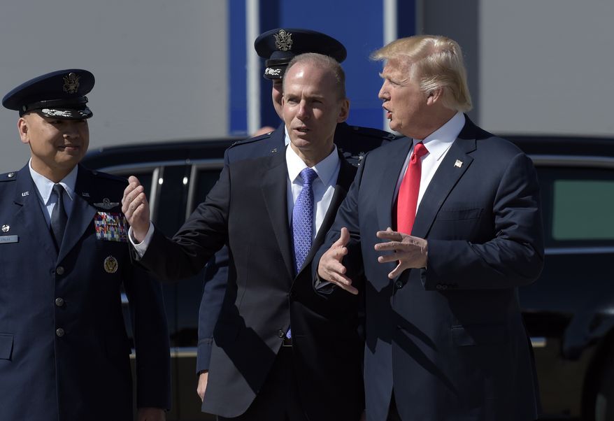 President Donald Trump talks with Boeing CEO Dennis Muilenburg upon his arrival on Air Force One at Charleston International Airport in North Charleston, S.C., Friday, Feb. 17, 2017. (AP Photo/Susan Walsh) ** FILE **