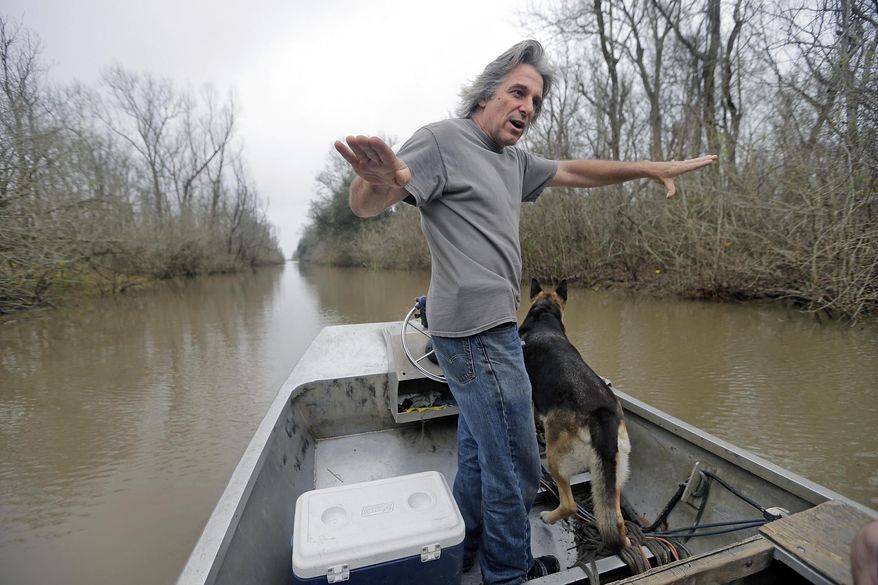 Dean Wilson, executive director of the Atchafalaya Basin keeper, shows off an existing pipeline canal in the Atchafalaya Basin on Wednesday, February, 8, 2017. The same canal would be used for the proposed Bayou Bridge Pipeline. (Brett Duke/NOLA.com The Times-Picayune via AP)