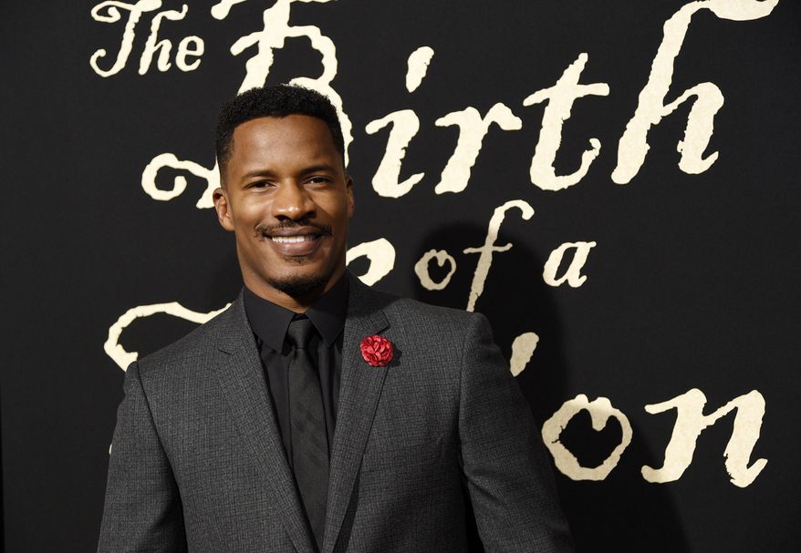 FILE - In this Sept. 21, 2016 file photo, Nate Parker, the director, screenwriter and star of "The Birth of a Nation," poses at the premiere of the film in Los Angeles. (Photo by Chris Pizzello/Invision/AP, File)