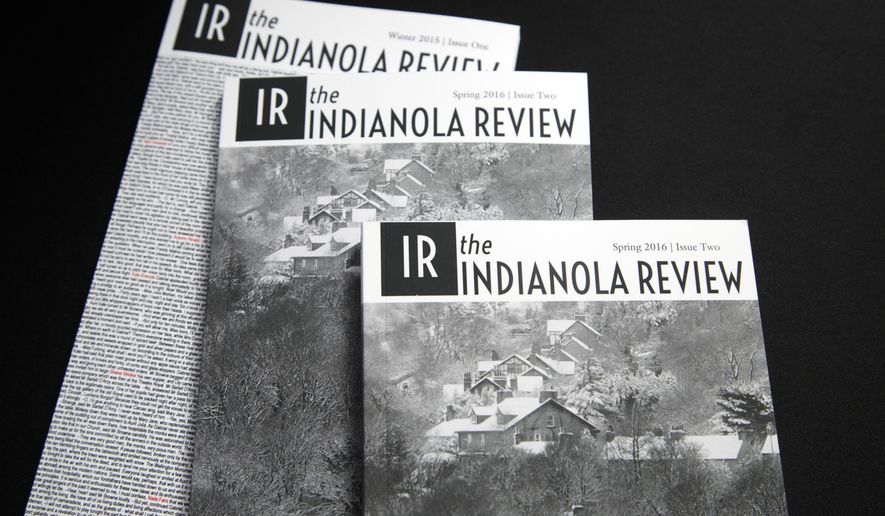 In this Jan. 24, 2017 photo, copies of the Indianola Review are displayed in Danny Judge's home office in Indianola, Iowa. Judge began writing the literary journal while his wife underwent chemotherapy. (Zach Boyden-Holmes/The Des Moines Register via AP )