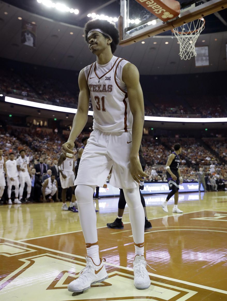 Texas forward Jarrett Allen (31) reacts after he missed a shot during the second half of an NCAA college basketball game against Kansas State, Saturday, Feb. 18, 2017, in Austin, Texas. Kansas State won 64-61. (AP Photo/Eric Gay)