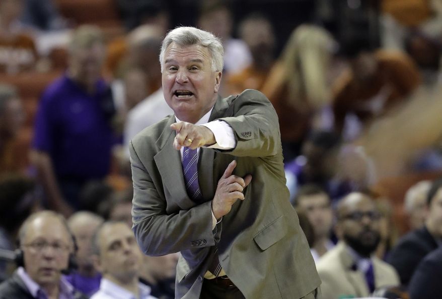 Kansas State head coach Bruce Weber calls to his players during the first half of an NCAA college basketball game against Texas, Saturday, Feb. 18, 2017, in Austin, Texas. (AP Photo/Eric Gay)