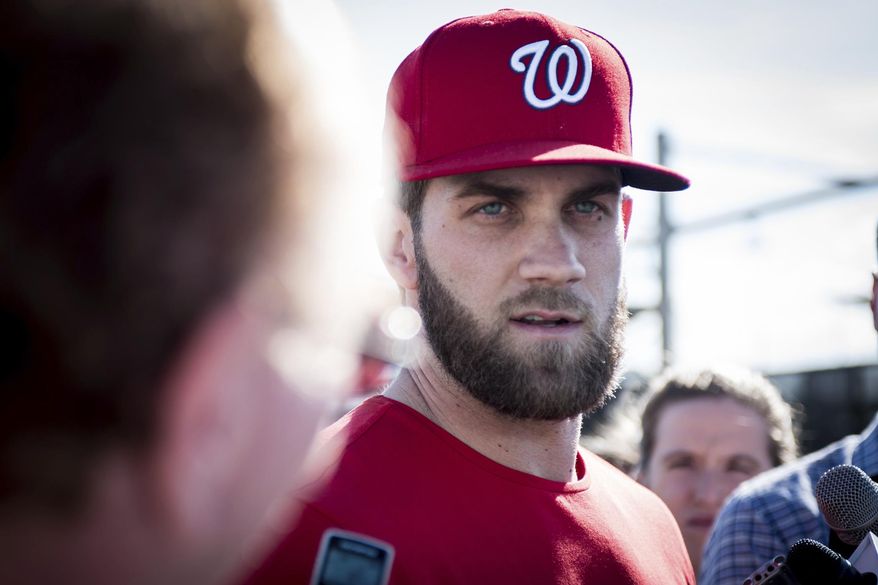 Washington Nationals right fielder Bryce Harper answers questions from the media at spring training baseball at The Ballpark of the Palm Beaches in West Palm Beach, Fla., on Saturday, Feb. 18, 2017. (Michael Ares/Palm Beach Post via AP)