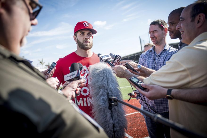 Washington Nationals right fielder Bryce Harper answers questions from the media at spring training baseball at The Ballpark of the Palm Beaches in West Palm Beach, Fla., on Saturday, Feb. 18, 2017. (Michael Ares/Palm Beach Post via AP)