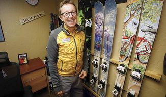ADVANCE FOR USE SATURDAY, FEB. 18 - In this Friday, Feb. 10, 2017 photo, Greg Ralph, vice president of sales and marketing at Purgatory Resort, talks about some of his favorite skis on that are in his office at the ski resort in Durango, Colo.  Ralph, who averages 80 ski days a year, has skied at nearly all resorts in six states: Colorado, California, Nevada, Idaho, Wyoming and New Mexico, as well as major resorts in Canada. (Jerry McBride/The Durango Herald via AP)