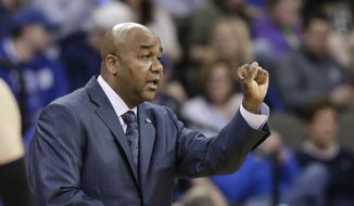Georgetown coach John Thompson III signals a play during the first half of an NCAA college basketball game against Creighton in Omaha, Neb., Sunday, Feb. 19, 2017. (AP Photo/Nati Harnik) **FILE**
