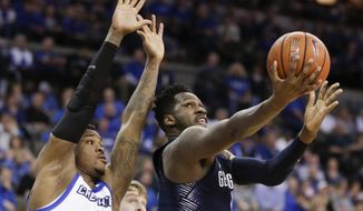 Georgetown&#39;s L.J. Peak, right, goes for a layup against Creighton&#39;s Marcus Foster (0) during the first half of an NCAA college basketball game in Omaha, Neb., Sunday, Feb. 19, 2017. (AP Photo/Nati Harnik)