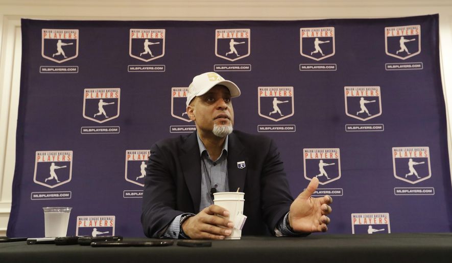 Executive Director of the Major League Players Association Tony Clark answers questions at a news conference Sunday, Feb. 19, 2017, in Phoenix. (AP Photo/Morry Gash)