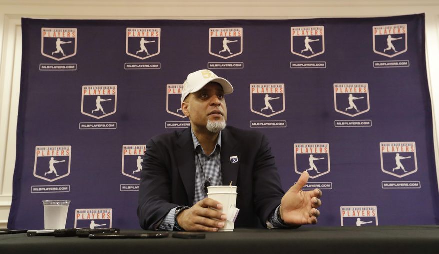 Executive Director of the Major League Players Association Tony Clark answers questions at a news conference Sunday, Feb. 19, 2017, in Phoenix. (AP Photo/Morry Gash)