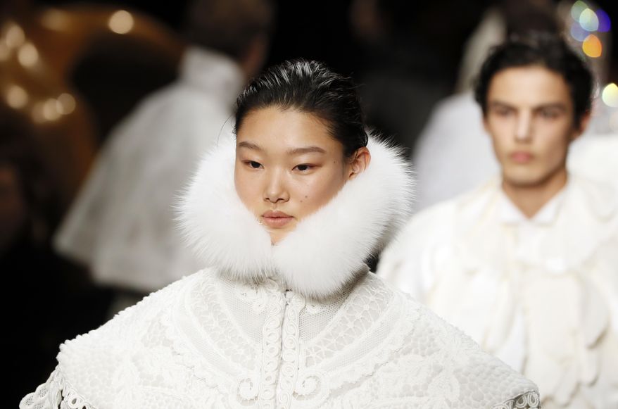 A model displays a creation by Burberry during their Autumn/Winter 2017 show as part of London Fashion Week in London, Monday, Feb. 20, 2017. (AP Photo/Kirsty Wigglesworth)