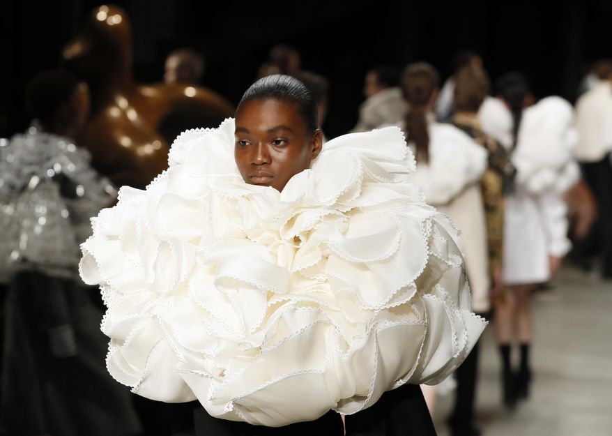 A model displays a creation by Burberry during their Autumn/Winter 2017 show as part of London Fashion Week in London, Monday, Feb. 20, 2017. (AP Photo/Kirsty Wigglesworth)