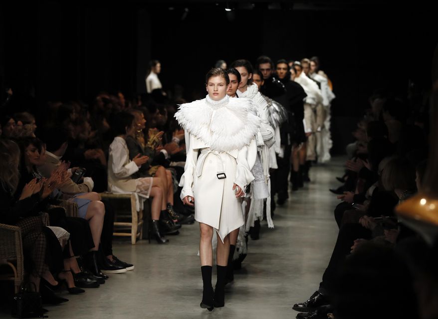 A model displays a creation by Burberry during their Autumn/Winter 2017 show as part of London Fashion Week in London, Monday, Feb. 20, 2017. (AP Photo/Kirsty Wigglesworth)