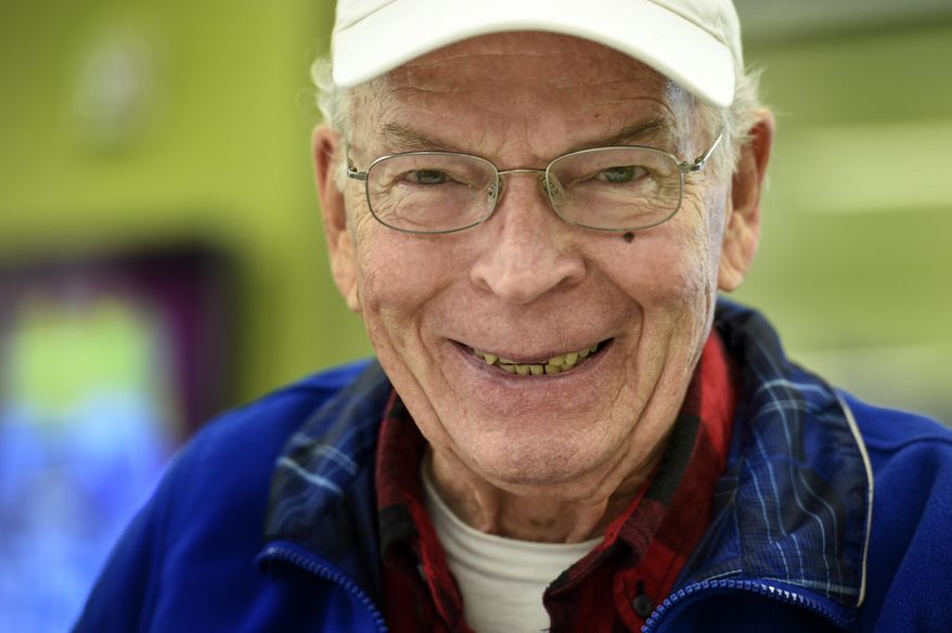 In this Jan. 31, 2017 photo, Hernando Chovil, 75, poses at at the Southeast Branch Library in Antioch, Tenn. Chovil is an immigrant from Columbia and is taking classes for his GED so that he can carry on his profession as a CPA here in America. (Lacy Atkins/The Tennessean via AP)