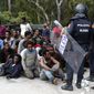 Migrants were captured by Spanish police after storming a fence to enter the Spanish enclave of Ceuta. Relentless waves of people have made the trek to the Spanish border seeking to escape the desperate poverty, terrorist violence, criminal bureaucracy and chaos of their respective countries in sub-Saharan and North Africa. (Associated Press/File) 