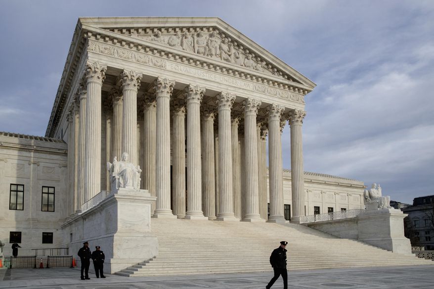 In this Feb. 14, 2017 photo, The Supreme Court is seen at day&#39;s end in Washington.  The Supreme Court on Tuesday is hearing an appeal to a case involving a 2010 shooting of a Mexican boy by a U.S. Border Patrol Agent.  (AP Photo/J. Scott Applewhite)