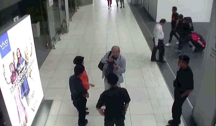 CORRECTS SOURCE - In this image made from Feb. 13, 2017, footage from Kuala Lumpur airport security cameras obtained by Fuji TV, Kim Jong Nam, exiled half-brother of North Korea&#39;s leader Kim Jong Un, talks to airport security and officials after he was attacked at Kuala Lumpur International Airport, Malaysia. Kim Jong Nam, the estranged half brother of North Korean ruler Kim Jong Un, died last week after apparently being poisoned in a Kuala Lumpur airport. (Footage from Kuala Lumpur airport security cameras obtained by Fuji TV via AP)