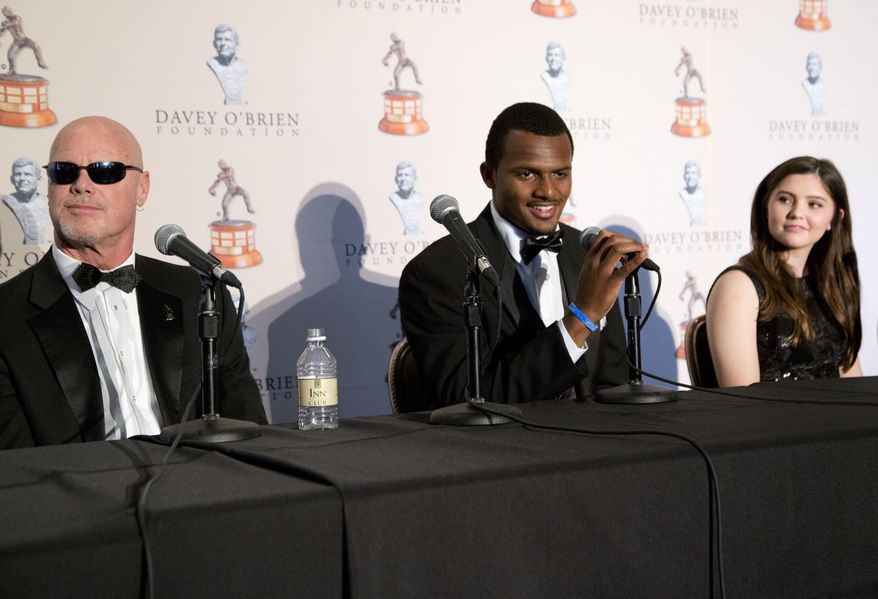 From left, Jim McMahon, the recipient of the Davey O'Brien Legends Award, Deshaun Watson of Clemson University, the recipient of the O'Brien national quarterback award, and Anna Connolly of J.J. Pearce High School in Richardson, Texas, the recipient of the High School Scholarship, attend a press conference before the annual Davey O'Brien award ceremony in Fort Worth, Texas, Monday, Feb. 20, 2017. Watson was presented his second consecutive Davey O'Brien Award as the nation's top quarterback. (Joyce Marshall/Star-Telegram via AP)