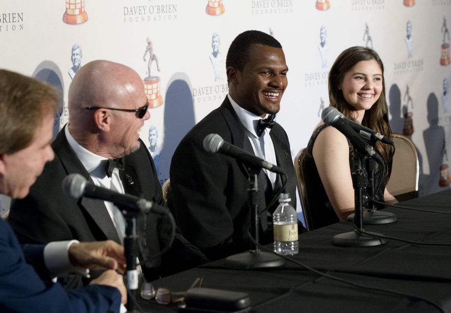 From left, Scott Murray, the recipient of the Charles Ringler Founder's Award, Jim McMahon, the recipient of the Davey O'Brien Legends Award, Deshaun Watson of Clemson University, the recipient of the O'Brien national quarterback award, and Anna Connolly of J.J. Pearce High School in Richardson, Texas, the recipient of the High School Scholarship, attend a press conference before the annual Davey O'Brien award ceremony in Fort Worth, Texas, Monday, Feb. 20, 2017. Watson was presented his second consecutive Davey O'Brien Award as the nation's top quarterback. (Joyce Marshall/Star-Telegram via AP)