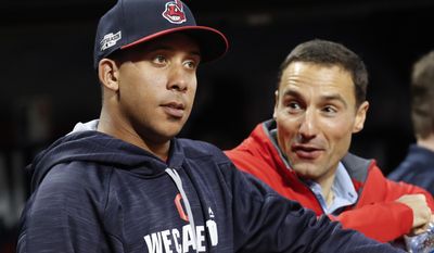 FILE - This Oct. 5, 2016 file photo shows Cleveland Indians&#x27; Michael Brantley, left, talking with team president Chris Antonetti during baseball practice in Cleveland. Brantley is convinced the ‘bad days’ are behind him after he missed nearly all of 2016 following shoulder surgery. The former All-Star played in just 11 games and watched as his teammates made the World Series. Brantley hasn’t been cleared to hit during spring training but remains positive about his recovery. (AP Photo/David Dermer, file)