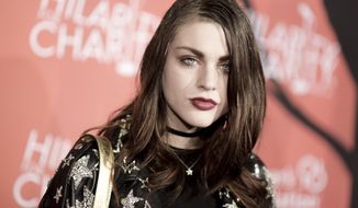 FILE - In this Oct. 15, 2016, file photo, Frances Bean Cobain attends the 5th Annual Hilarity for Charity Variety Show: Seth Rogen&#39;s Halloween in Los Angeles. Cobain posted a tribute to her late father Kurt Cobain on what would have been his 50th birthday on Feb. 20, 2017. (Photo by Richard Shotwell/Invision/AP, File)