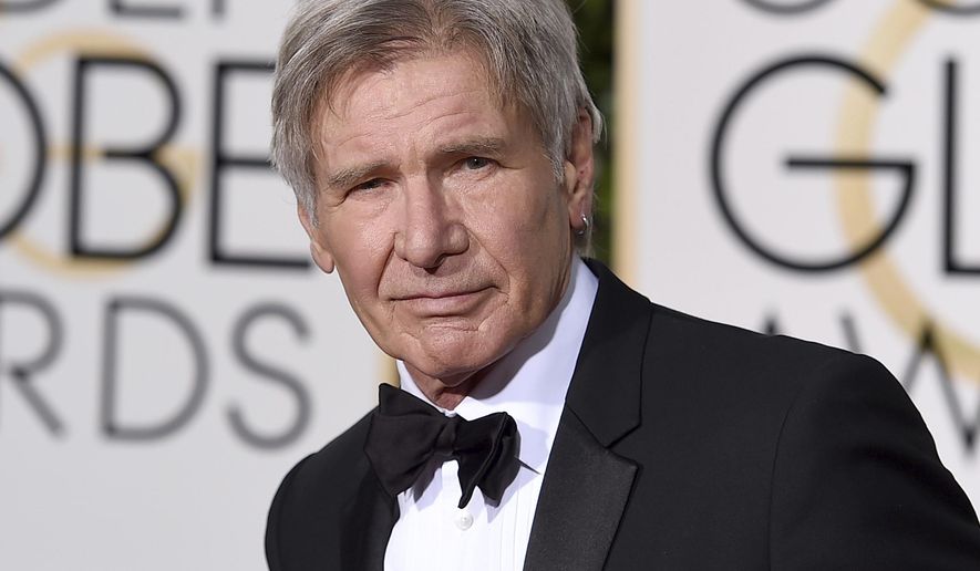 FILE - In this Jan. 10, 2016 file photo, Harrison Ford arrives at the 73rd annual Golden Globe Awards in Beverly Hills, Calif. Newly released video shows a plane piloted by Ford mistakenly flying low over an airliner that was taxiing at a Southern California airport. The 45 seconds of video released Tuesday, Feb. 21, 2017, shows the 74-year-old "Star Wars" and "Indiana Jones" star's potentially serious mishap at John Wayne Airport in Orange County. (Photo by Jordan Strauss/Invision/AP, File)