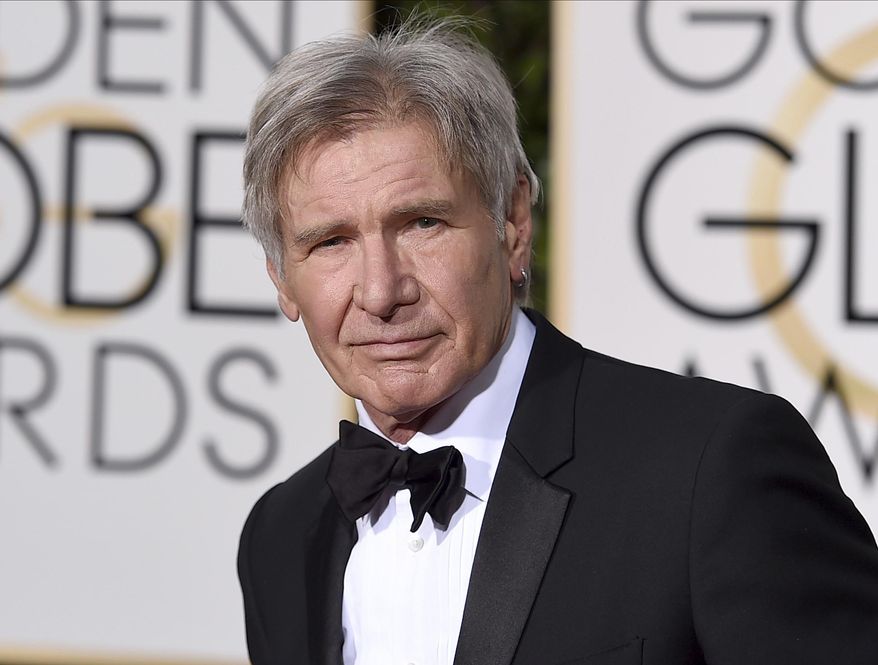 FILE - In this Jan. 10, 2016 file photo, Harrison Ford arrives at the 73rd annual Golden Globe Awards in Beverly Hills, Calif. Newly released video shows a plane piloted by Ford mistakenly flying low over an airliner that was taxiing at a Southern California airport. The 45 seconds of video released Tuesday, Feb. 21, 2017, shows the 74-year-old "Star Wars" and "Indiana Jones" star's potentially serious mishap at John Wayne Airport in Orange County. (Photo by Jordan Strauss/Invision/AP, File)