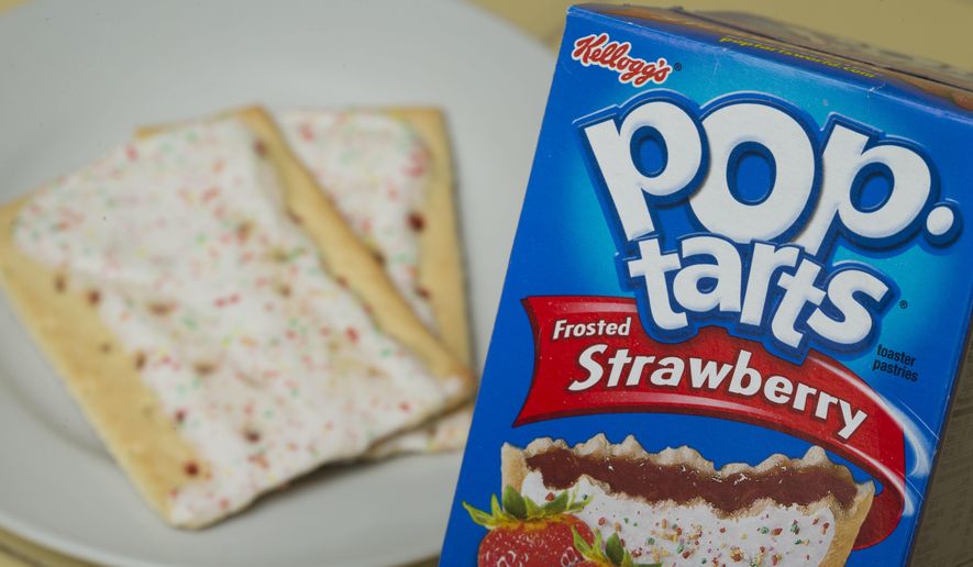FILE - In this Monday, April 29, 2013, file photo, Kellogg's brand Strawberry flavored Pop-Tarts are arranged for a photo in Surfside, Fla. Kellogg's transformed its New York City restaurant into a Pop--Tarts Cafe for several days beginning Feb. 21, 2017. (AP Photo/Wilfredo Lee, File)