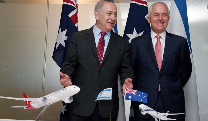 Israeli Prime Minister Benjamin Netanyahu, left, and Australian Prime Minister Malcolm Turnbull share a laugh during the signing of agreements between the two countries at the Commonwealth Parliamentary offices in Sydney, Thursday, Feb. 23, 2017. Netanyahu is on a four-day visit to Australia, the first official visit by an Israeli prime minister. (Dean Lewins/Pool via AP)