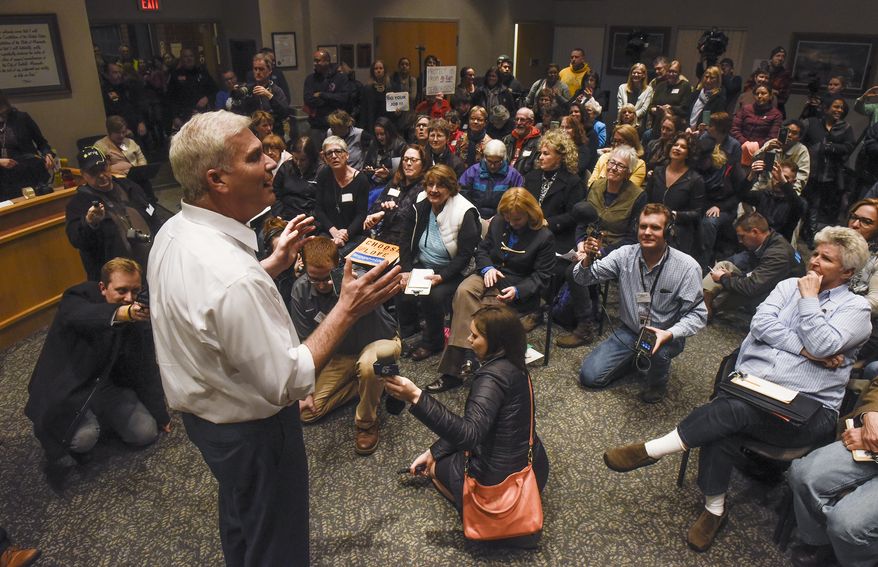 U.S. Rep. Tom Emmer answers a question near the end of a town hall meeting in Sartell, Minn., Wednesday, Feb. 22, 2017. Emmer&#x27;s town hall went on as planned after the congressman said he would shut down the event if protests or unruly attendees disrupted the conversation. (Dave Schwarz/St. Cloud Times via AP)
