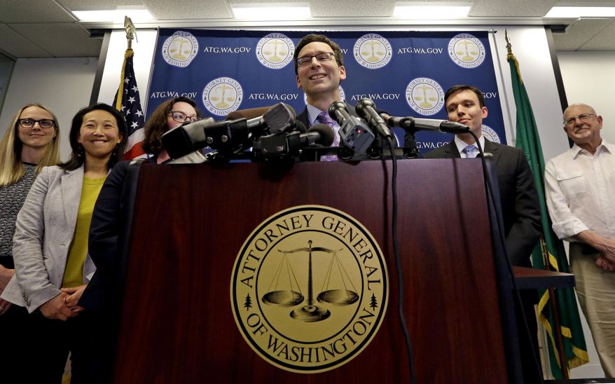 FILE--In this Feb. 9, 2017, file photo, Washington Attorney General Bob Ferguson speaks at a news conference in Seattle, Wash. Washington state's top lawyer stopped President Donald Trump's immigration executive order by filing a lawsuit and Oregon Attorney General Ellen Rosenblum is strategizing how to fight back if the federal government tries to withhold funds to force compliance with conservative policies, like on abortion. (AP Photo/Elaine Thompson, file)