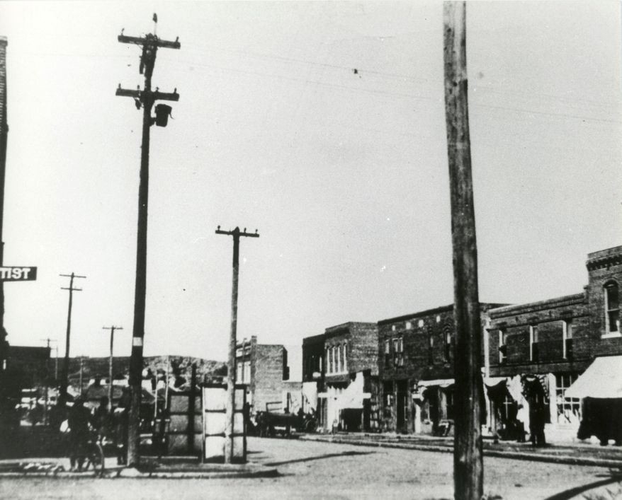 In this undated photo provided by Tulsa Historical Society and Museum, Greenwood neighborhood also known as Black Wall Street in Tulsa, Okla., is seen before the race riot leveled the area in 1921. The once-prosperous section of Tulsa that became the site of one of the worst race riots in American history is attempting to remake itself again after decades of neglect. Black leaders want to bring 100 new companies to the former Black Wall Street in north Tulsa by 2021, the 100th anniversary of its fall. (Courtesy of Tulsa Historical Society &amp;amp; Museum via AP)