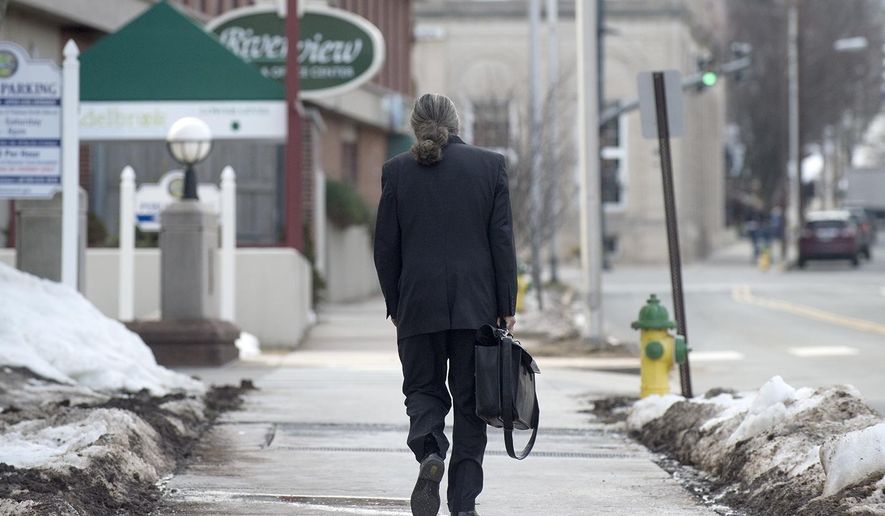 Tony Moreno's defense attorney Norman A. Pattis leaves Middlesex Superior Court on Wednesday, Feb. 22, 2017, following the guilty verdict of his client in Middletown, Conn. Moreno threw 7-month-old Aaden off the Arrigoni Bridge that spans the Connecticut River between Middletown and Portland on July 15, 2015, and then jumped intending to kill himself, prosecutors said. (Patrick Raycraft/Hartford Courant via AP, Pool)