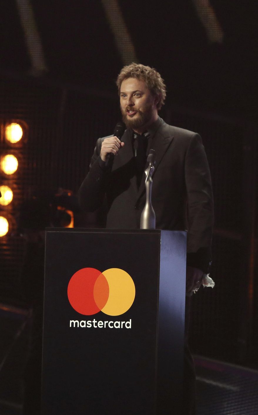 Duncan Jones, son of the late David Bowie, accepts the award for Album Of The Year on behalf of his father on stage at the Brit Awards 2017 in London, Wednesday, Feb. 22, 2017. (Photo by Joel Ryan/Invision/AP)