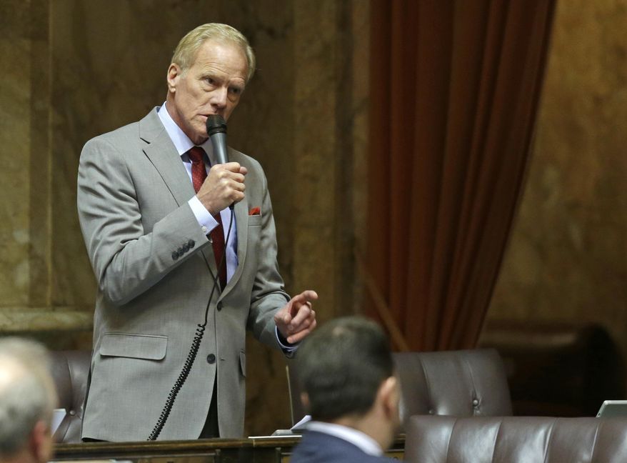 Rep. Paul Harris, R-Vancouver, speaks on the House floor, Wednesday, Feb. 22, 2017, during debate over education funding at the Capitol in Olympia, Wash. The House approved its education funding proposal Wednesday, just weeks after the Republican-led Senate passed its own plan. Both sides will now need to negotiate a final compromise. Lawmakers are working to comply with a 2012 state Supreme Court ruling that they must fully fund the state's basic education system. (AP Photo/Ted S. Warren)