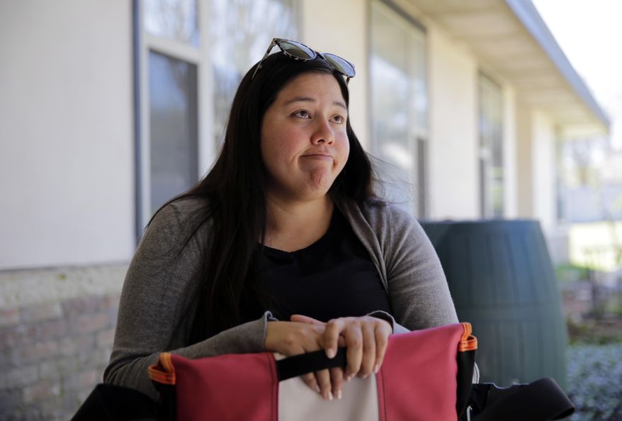 Grassroots Immigrations Programs Director Cristina Parker talks about the challenges facing immigrants living illegally in the United States, Wednesday, Feb. 22, 2017, in Austin, Texas. Around the country, President Donald Trump's efforts to crack down on the estimated 11 million immigrants living illegally in the U.S. have spread fear and anxiety and led many people to brace for arrest and to change up their daily routines in hopes of not getting caught. (AP Photo/Eric Gay)