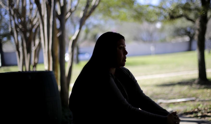 Grassroots Immigrations Programs Director Cristina Parker talks about the challenges facing immigrants living illegally in the United States, Wednesday, Feb. 22, 2017, in Austin, Texas. Around the country, President Donald Trump's efforts to crack down on the estimated 11 million immigrants living illegally in the U.S. have spread fear and anxiety and led many people to brace for arrest and to change up their daily routines in hopes of not getting caught. (AP Photo/Eric Gay)