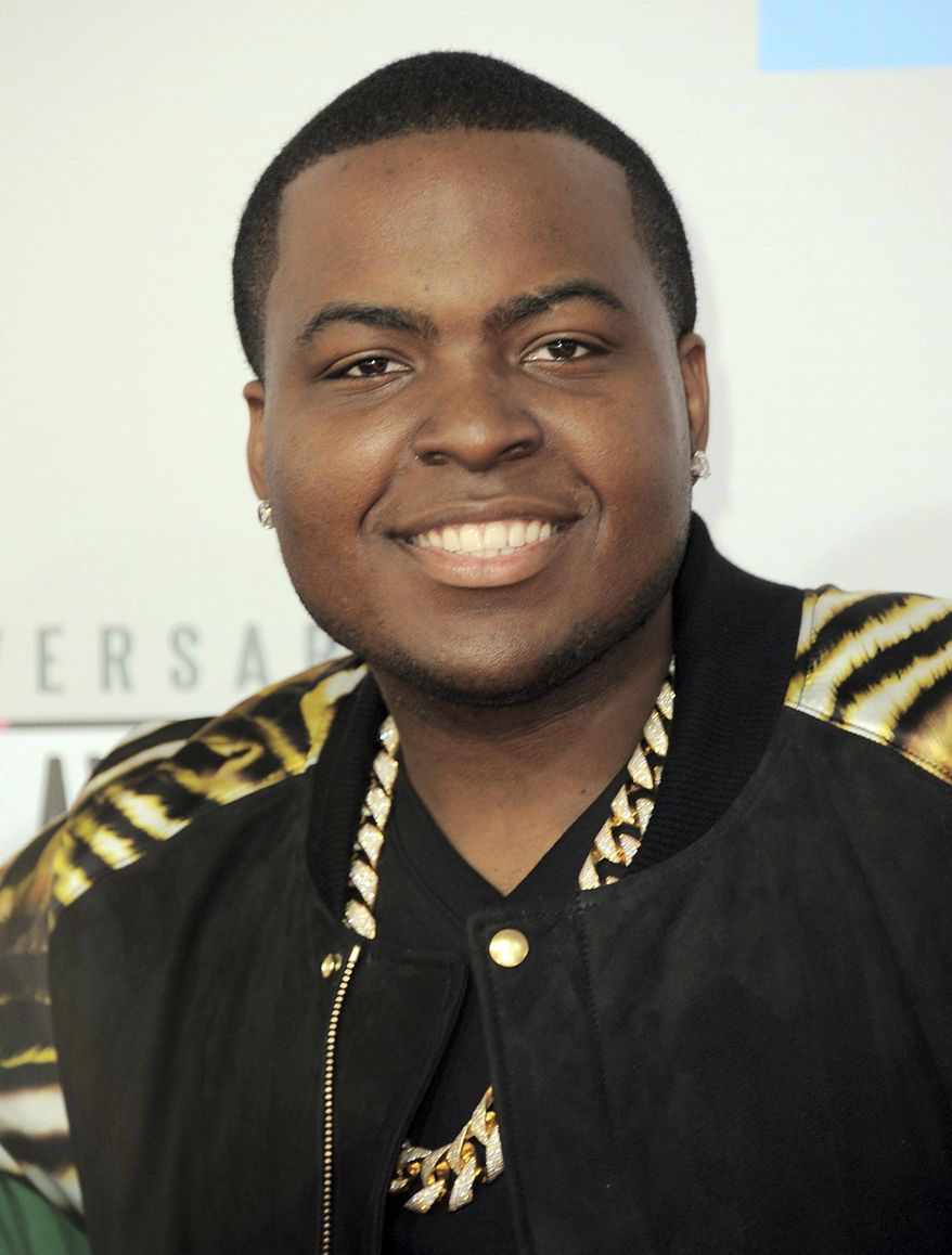 FILE - In this Nov. 18, 2012 file photo, rapper Sean Kingston arrives at the 40th Anniversary American Music Awards in Los Angeles. A Florida man is facing felony charges after police say a shot was fired during a fight between Kingston and three-member hip-hop group Migos outside a Las Vegas Strip convention center, Tuesday, Feb. 21, 2017. Authorities said the shot was fired in the air and no one was reported to have been injured. (Photo by Jordan Strauss/Invision/AP, File)